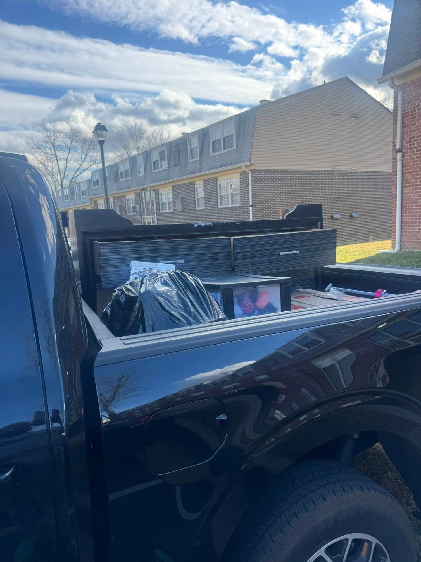 Truck loaded with old furniture and household items